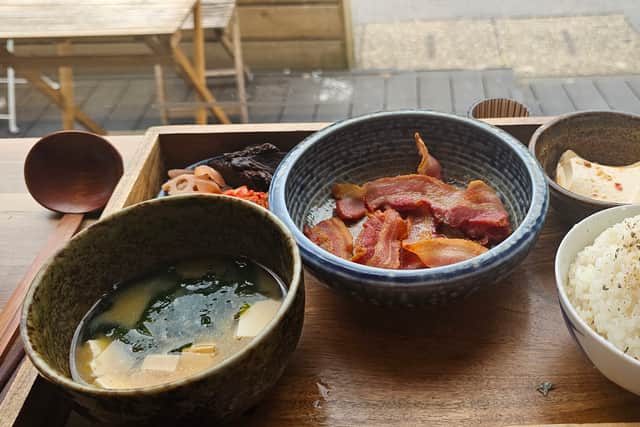 The apanese Streaky Bacon Breakfast (£12.98) is beautifully set across a wooden tray and came with bowls of bacon, rice, miso soup, silken tofu and house made pickles as well as the choices of chop sticks, a fork, a knife and a ramen spoon. Overall, the dish has generous servings, is filling and balanced.